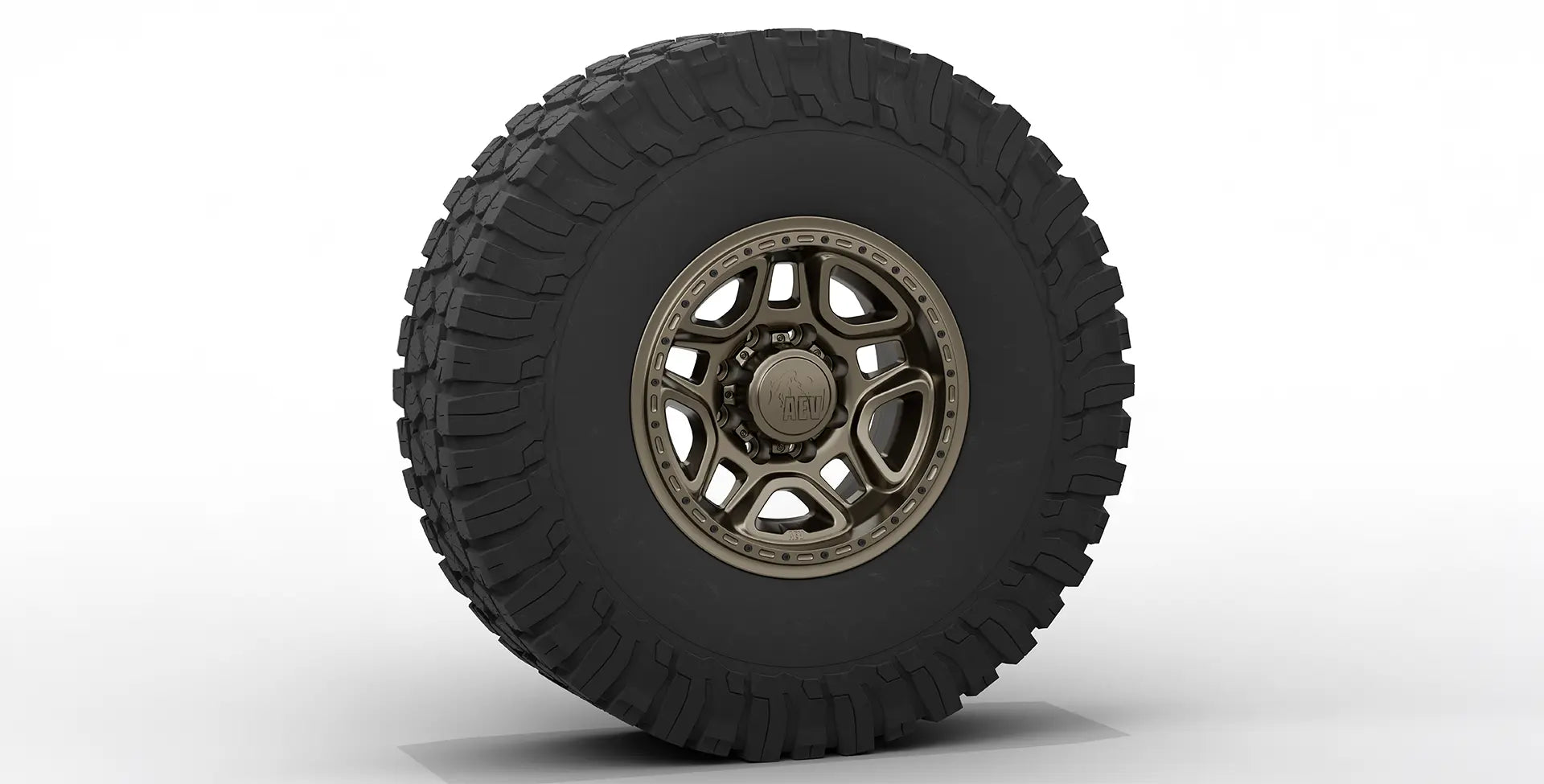 Off-road tire with a metallic rim on a white background | Bronze Finish with Hardware Kit