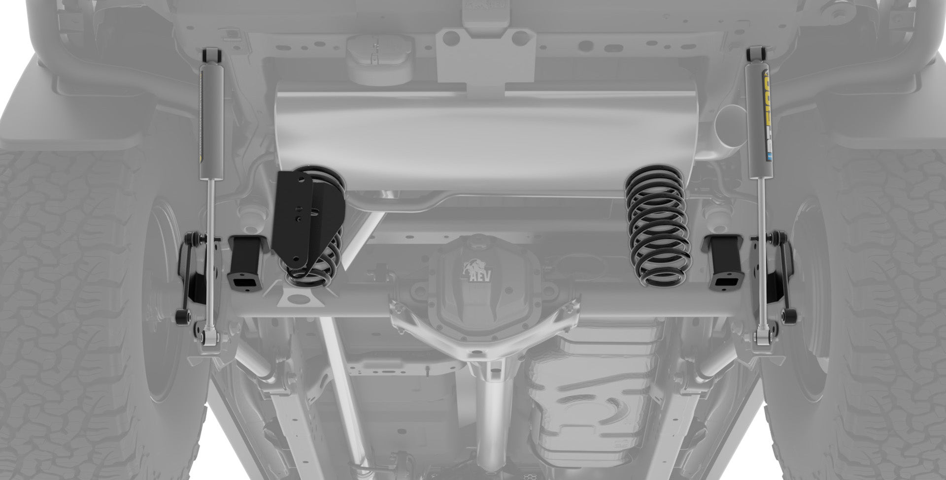 Close-up of a vehicle's undercarriage with suspension components. | Rear suspension components