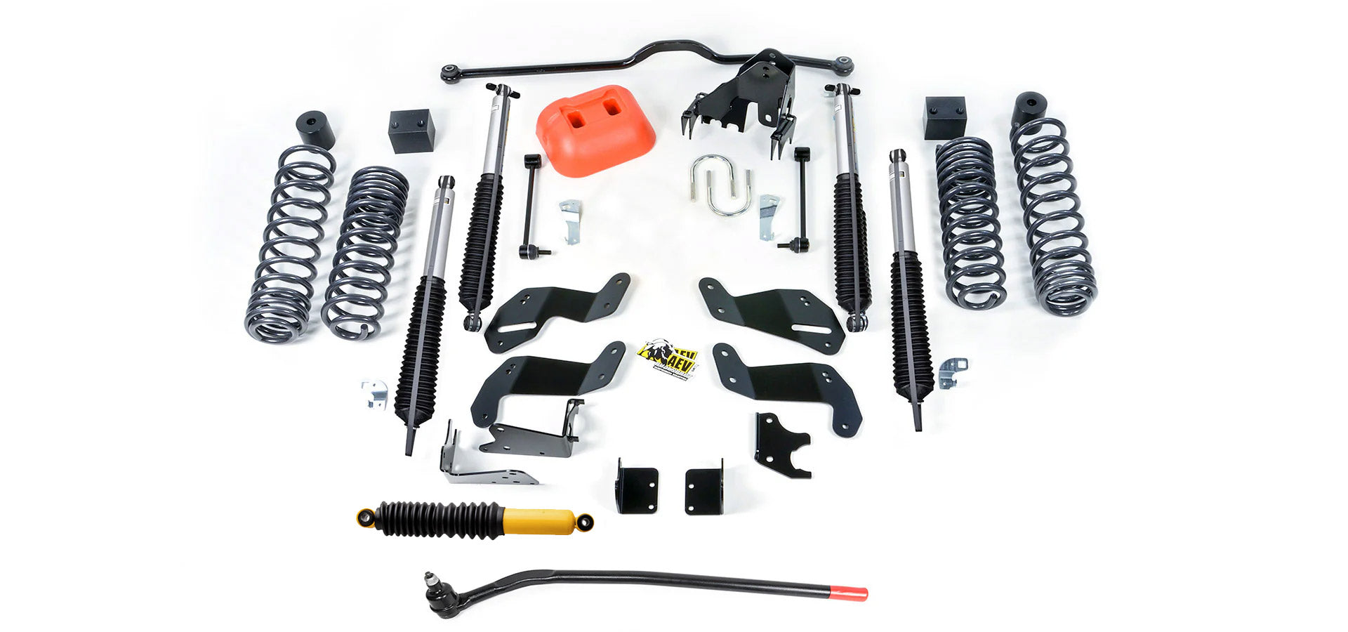 Collection of automotive suspension parts on a white background