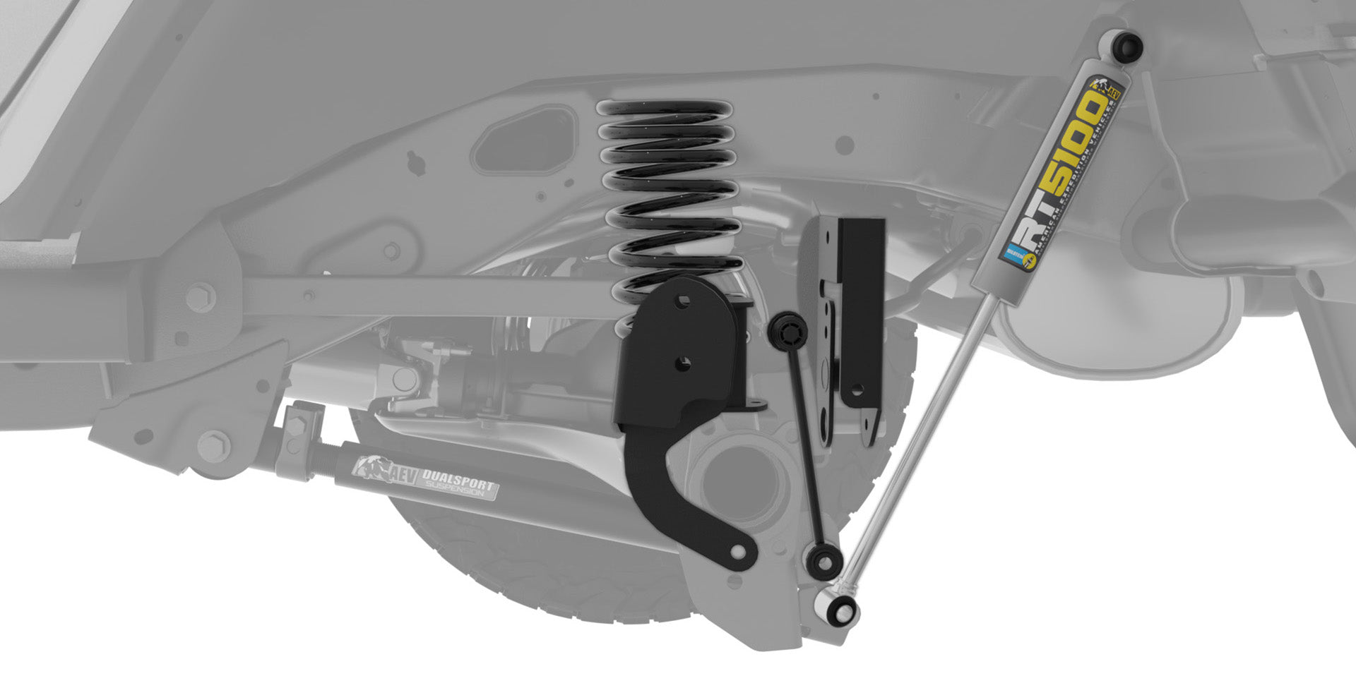 Close-up of a vehicle suspension system with 'AEV' branding. | Rear suspension components